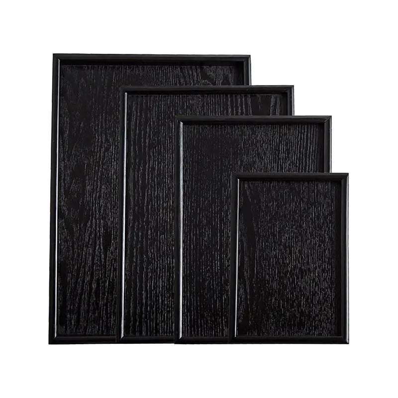 Bandejas de madera negra de estilo japonés.